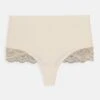 Magic Bodyfashion Dream Hi Thong - String - Latte -Triumph 88aa18c78d764e77bfae345e09bf81cd